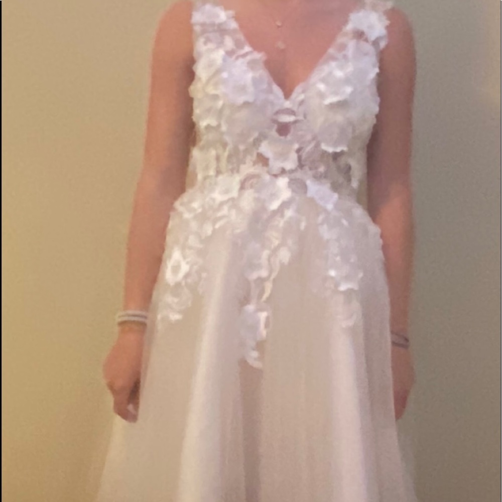 Layered dress with flower appliqué